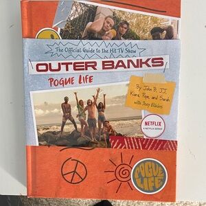 Outer Banks Pogue Life Amulet Book.